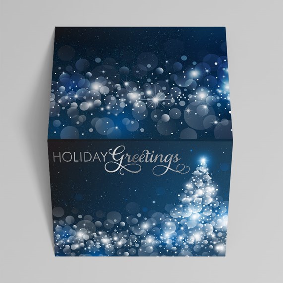 navy holiday gift box with white bokeh lights, star sparkles and 