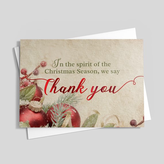 holiday card design with ornaments and greenery, text area