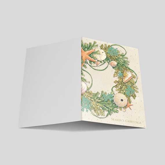 greeting card with wreath design and text