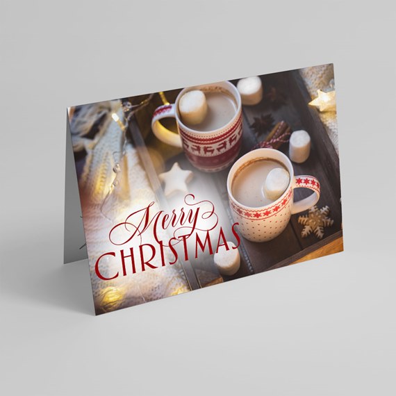 holiday greeting card with mugs and text