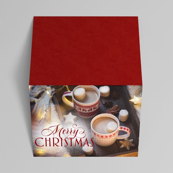 holiday card with hot chocolate and decorative text