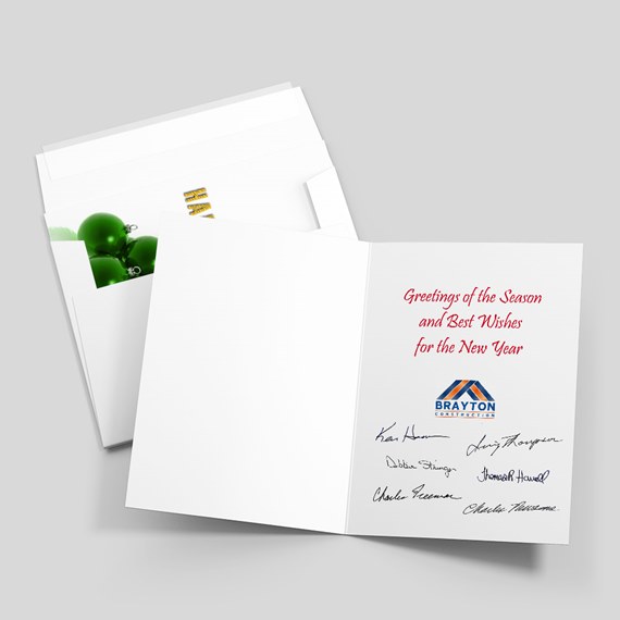 greeting card with red text and green ornaments, customizable text area