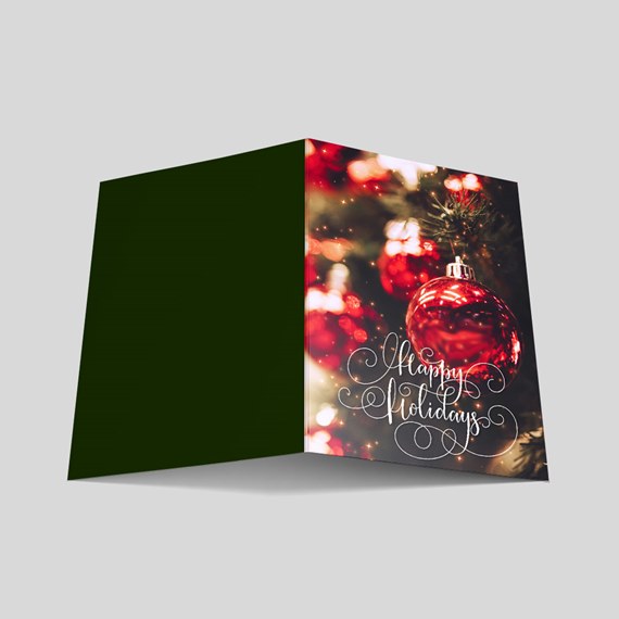 holiday card with ornament and text