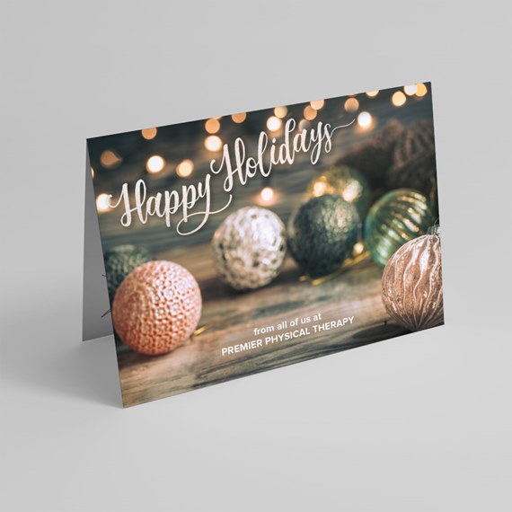 holiday card with ornaments and text
