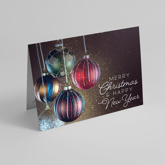 holiday card with ornaments and text