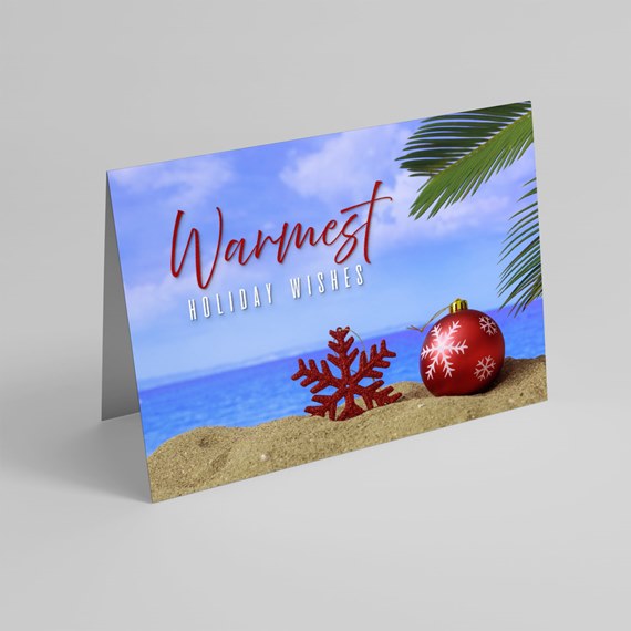 beach holiday card with snowflake and ornament