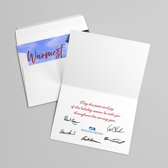 opened greeting card with warmest message and signatures