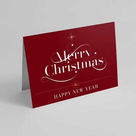 Folded burgundy holiday card reading 'Merry Christmas' in white script with gold accents and 'Happy New Year' text