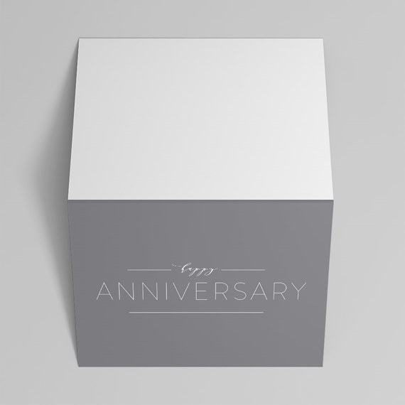 cube box with anniversary text