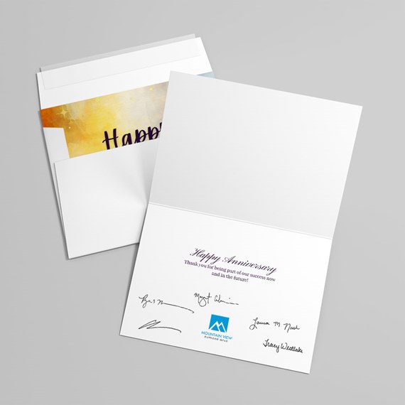 greeting card with watercolor design and anniversary message