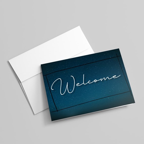 greeting card with welcome text and starry background