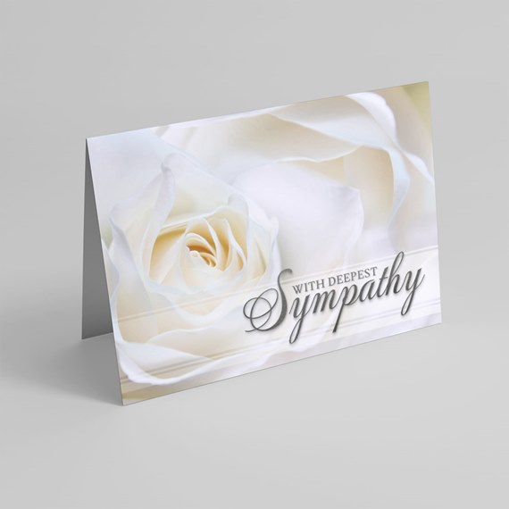 greeting card with white rose and sympathy text