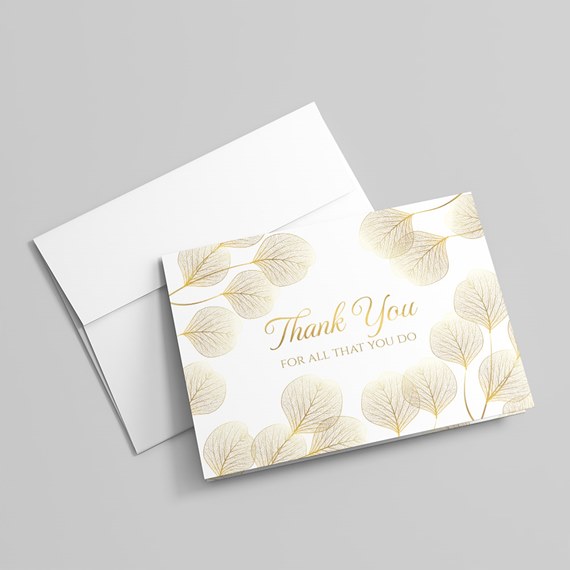 thank you card with gold leaf designs and text
