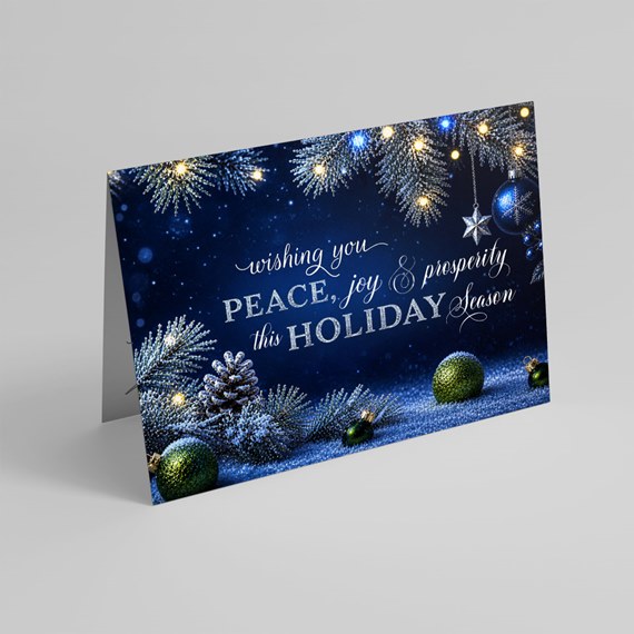 holiday greeting card with ornaments and snow effect