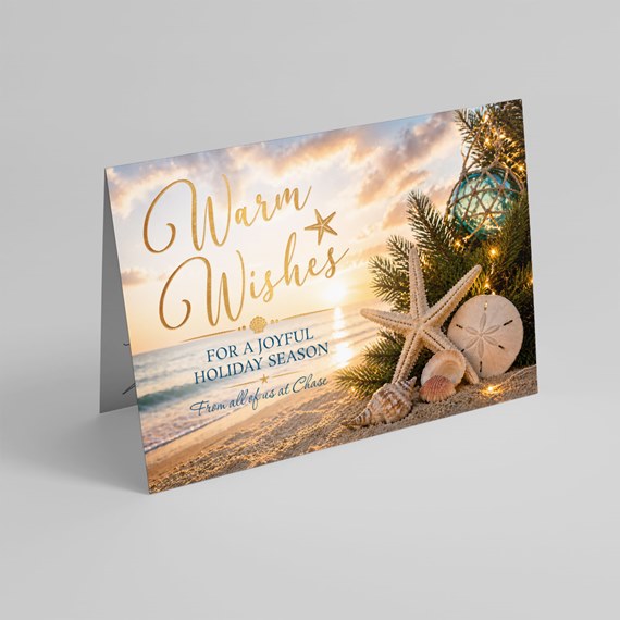 beach-themed greeting card with seashells and text
