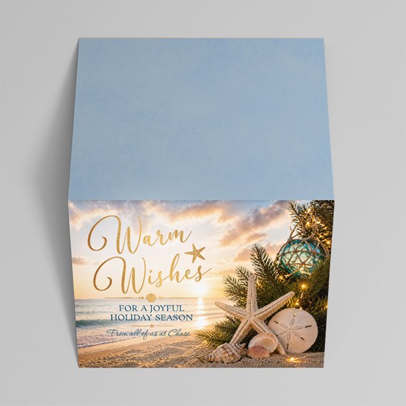beach-themed holiday card with seashells and starfish