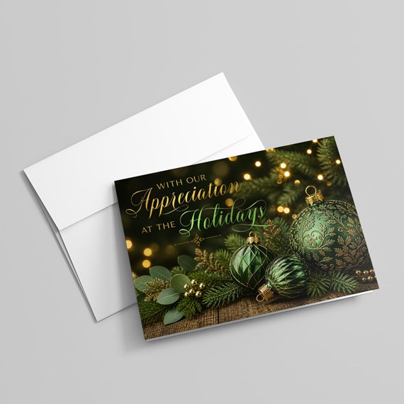 holiday card with green ornaments and gold text