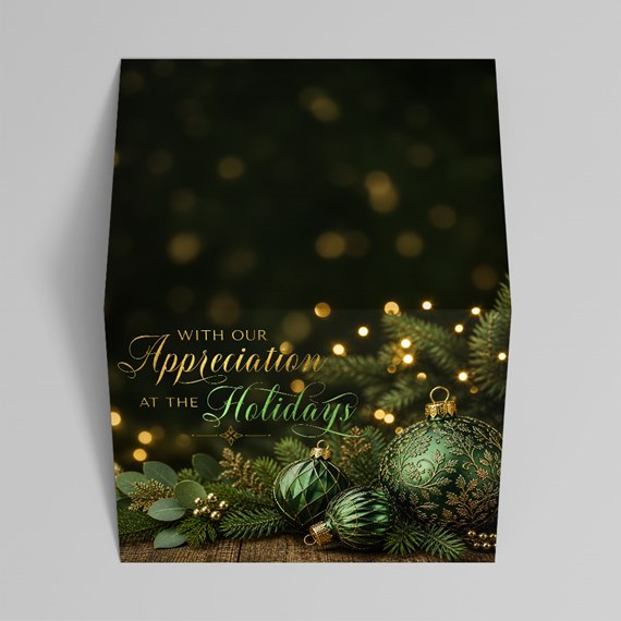green ornament design with holiday text