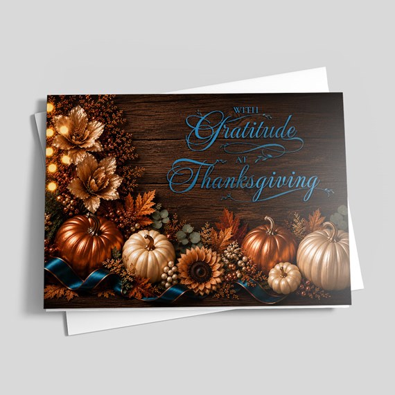 autumn-themed greeting card with pumpkins and foliage