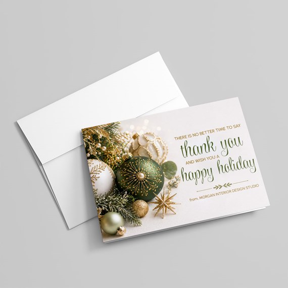holiday card with decorative ornaments and text