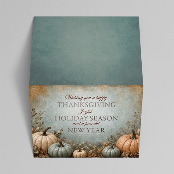 Seasonal greeting card with pumpkins and text