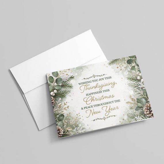 holiday card with floral design and gold text