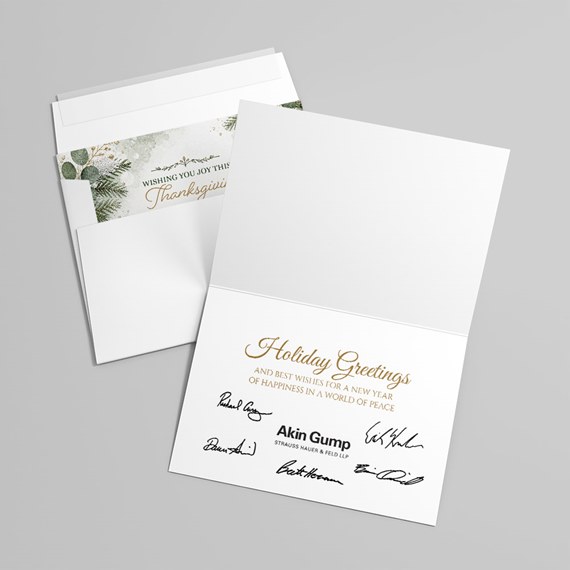 folded greeting card with holiday design and signatures
