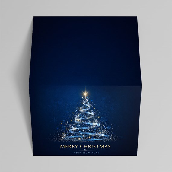 blue box with Christmas tree design and gold text