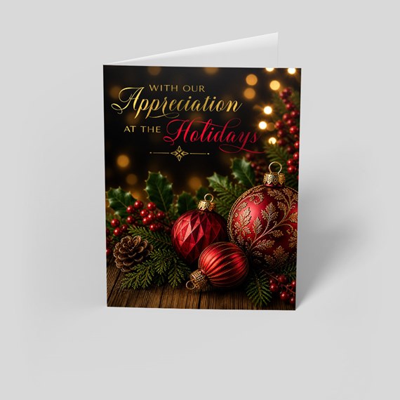 holiday card with ornaments and greenery