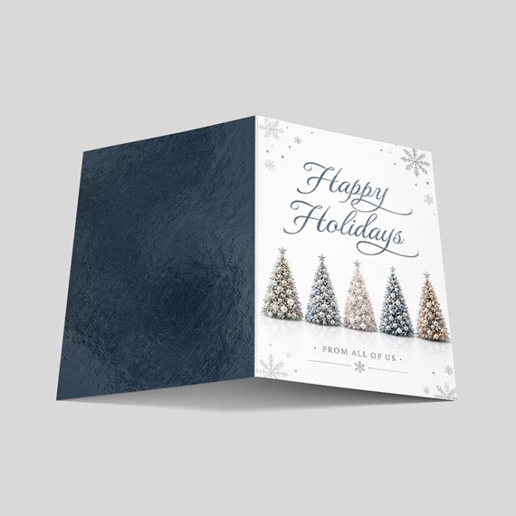 holiday card with decorative trees and text