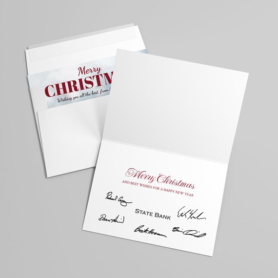 folded card with Christmas greeting and printed signatures