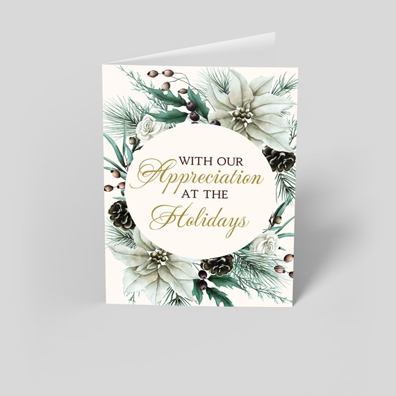 holiday card design with floral elements and gold text