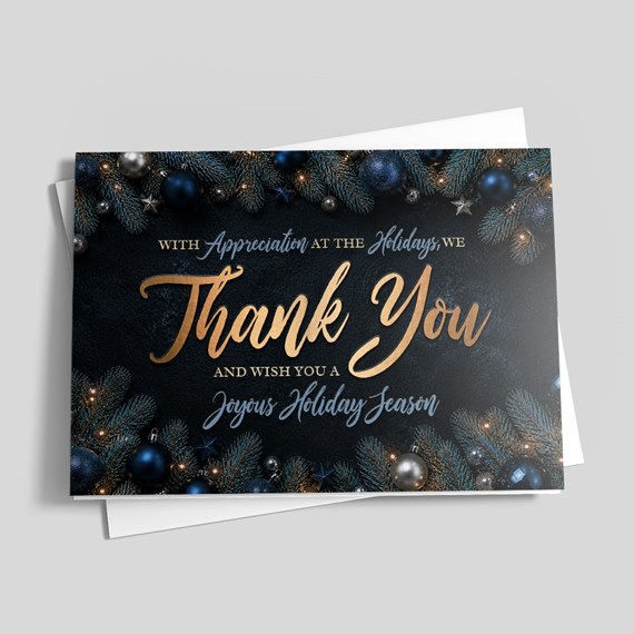holiday thank you card with evergreen branches and blue ornaments