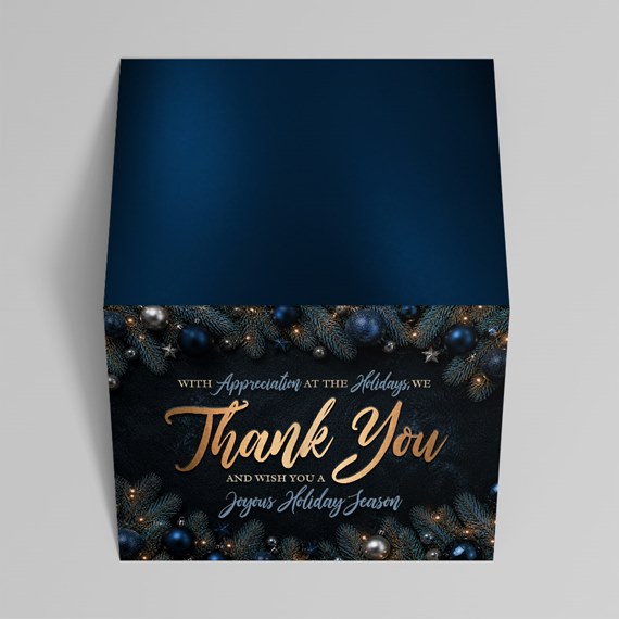 holiday thank you card design with evergreen and ornaments