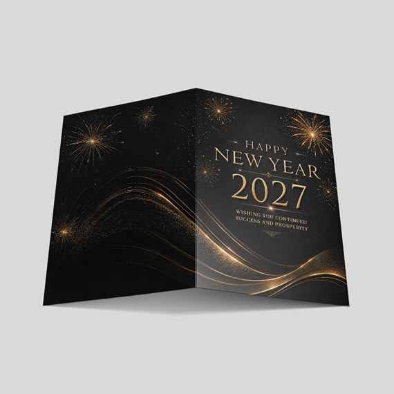 black card with gold fireworks and text