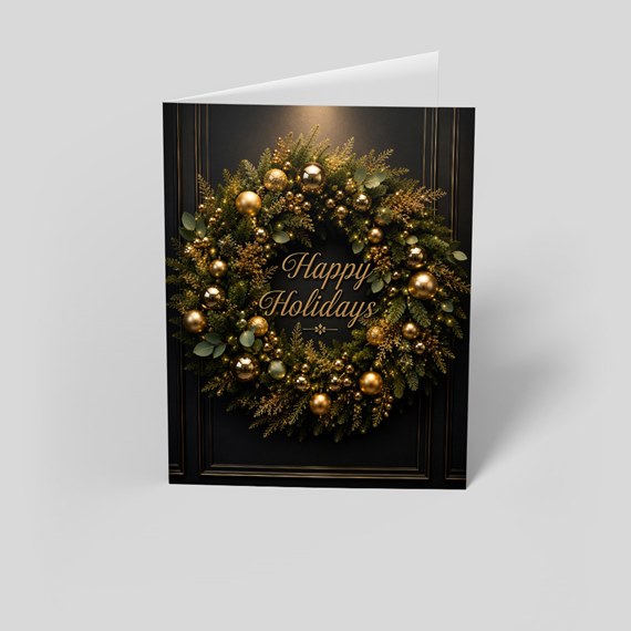 holiday card with wreath and gold text