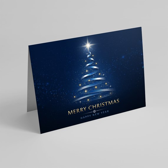 greeting card with Christmas tree design and gold text