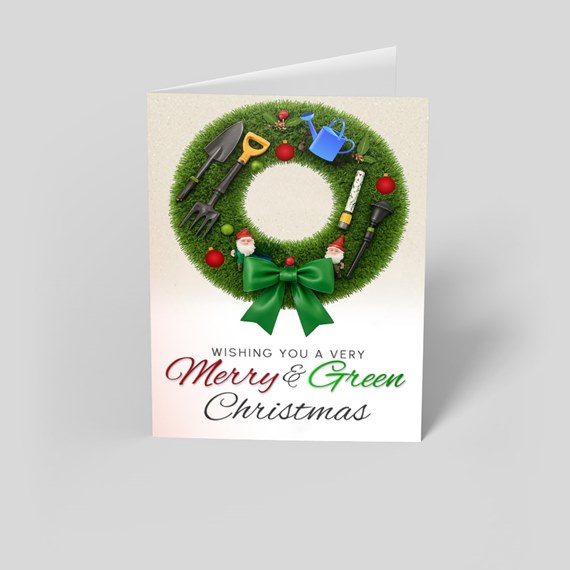 greeting card with wreath and gardening tools