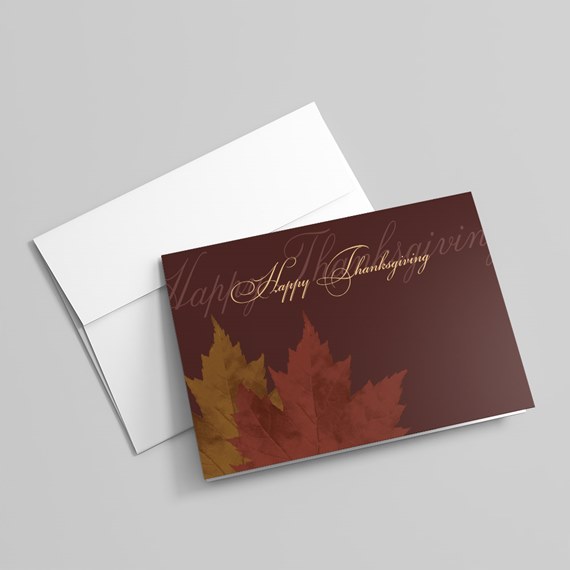 Thanksgiving card with leaves design and gold text