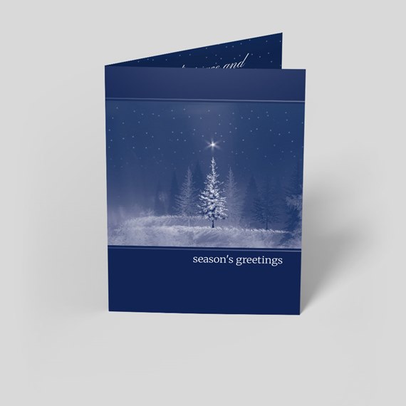 dark blue greeting card with snowy landscape and text placeholder