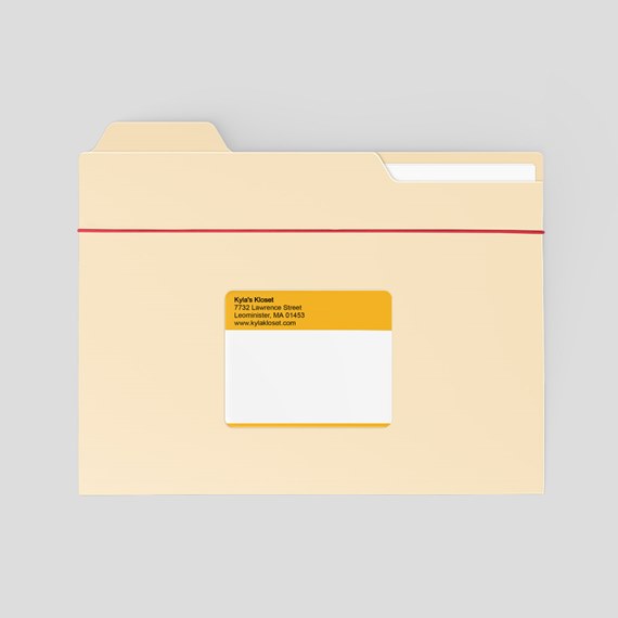 beige file folder with top tab and yellow label area