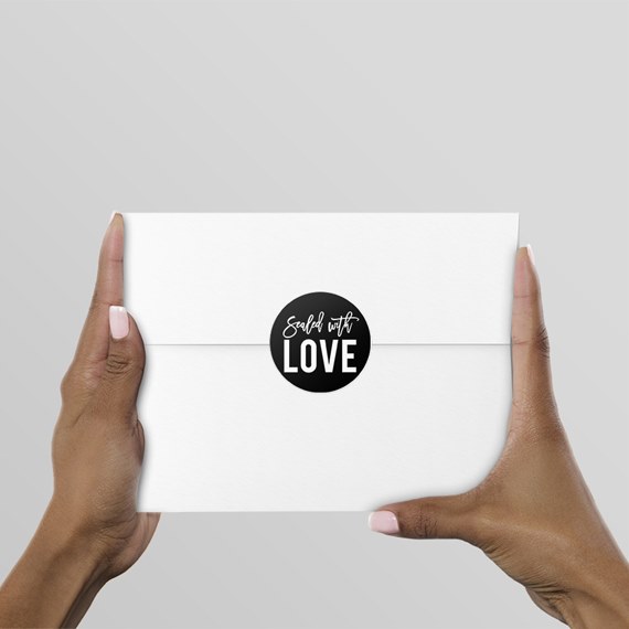white envelope with black sticker, photo placeholder