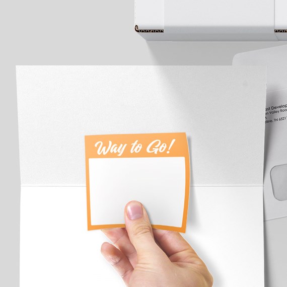 orange sticky note with white text